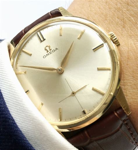 omega solid gold watch|best solid gold investment watches.